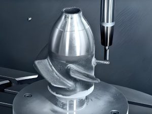 Multi-axis metal 3D printing tool head positioning near a printed curved turbine component on a rotary platform.